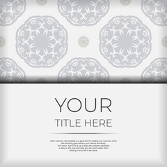 Luxurious White color postcard template with abstract patterns. Print-ready invitation design with mandala ornament.