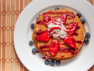 Breakfast pancakes with strawberries