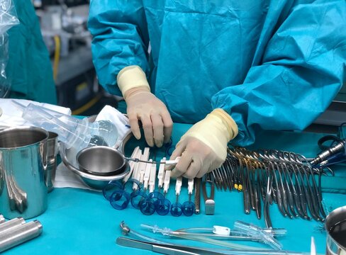 Prosthetic heart valve sizer during open heart surgery.
