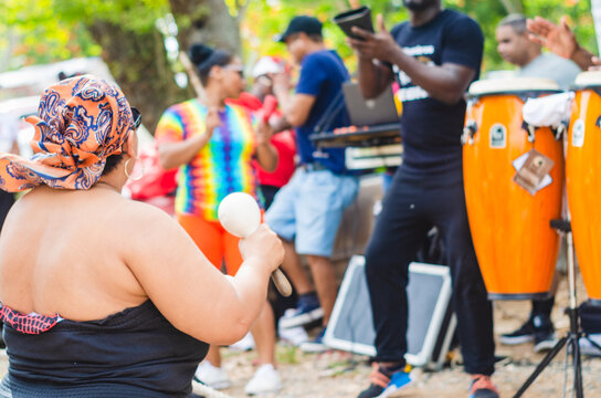 party on the beach with a group of salsan merengue and bachata with instruments