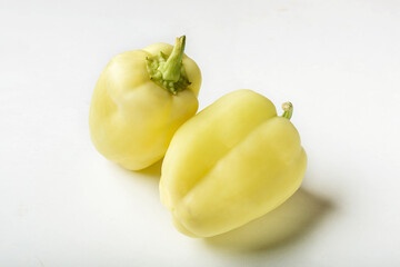 Sweet light green pepper on a white background