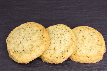 row of homemade cookies with earl grey tea