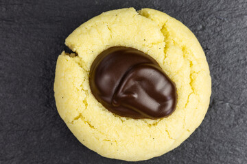 thumbprint cookie filled with chocolate