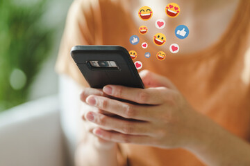 Young Asian woman using smartphone typing, chatting conversation. Social Network, technology concept