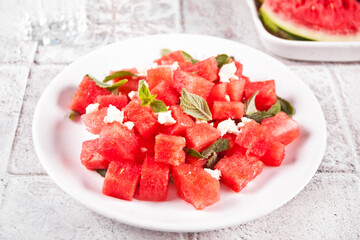 Salad with watermelon, feta cheese and mint leaf