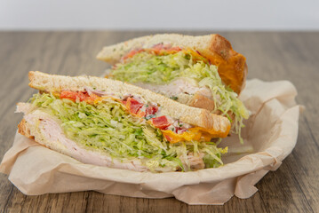 Turkey, mayo, and lettuce sandwich loaded with all the good fixings to completely fill any appetite for a meal