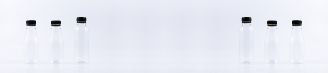 plastic bottle on a white background,Closeup many plastic water bottle with cap isolated on over white background