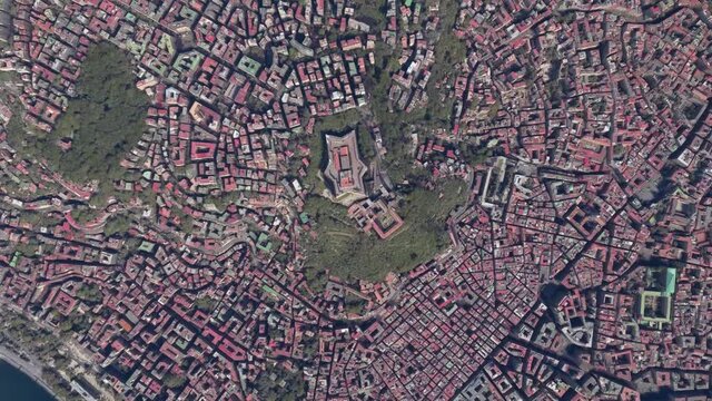 Aerial view of Naples in Italian Napoli is regional capital of Campania and third-largest city of Italy showing downtown and Castel Sant'Elmo is a medieval fortress 4k high resolution animation
