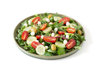 Salad made with arugula, tomatoes, cucumbers, mozzarella and olives