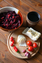 Top view Ukrainian refreshment - salo, varya salad, vegetables