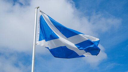 The St. Andrew Cross, national flag of Scotland, flying in the wind,