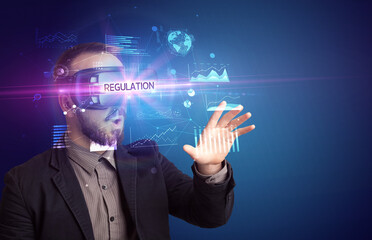 Businessman looking through Virtual Reality glasses
