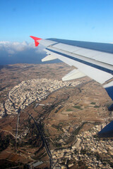 A view of the West side of Malta from a plane take off, nearest village is Siggiewi
