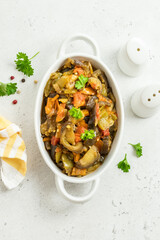 Mushroom vegetable saute in baking dish. Space for text, top view