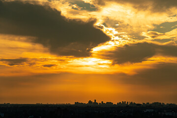 Sky beautiful hot summer background. Detailed clouds at sunrise. Sunny yellow and white sky and...