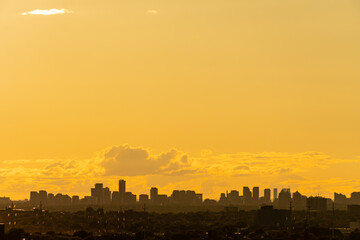 Toronto Canada scenic view of cityscape skyline at hot scorch summer evening sunset. Orange dusk...