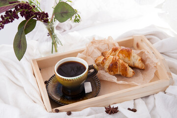 Good morning black coffee with crispy croissants