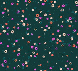 Cute floral pattern. Seamless vector pattern. Elegant template for fashion prints. Small colorful  flowers for print. Dark blue green background. Stock vector.