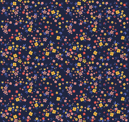 Cute floral pattern in the small flower. Seamless vector texture. Elegant template for fashion prints. Printing with small yellow  and red flowers. Dark blue background. Stock print.