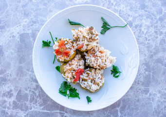 Traditional Turkish dish stuffed peppers on marble background.