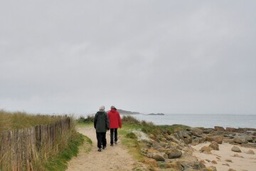 Group of hikers at seaside in Brittany France