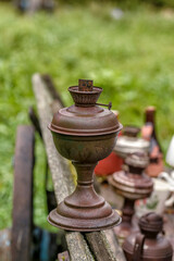 An old kerosene lamp, out of use. Ancient lighting device.