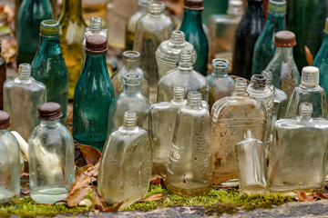 Old bottles of various drinks.