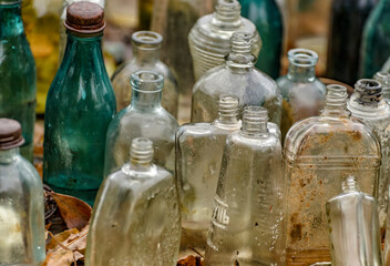 Old bottles of various drinks.