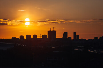 City landscape with buildings and towers at the evening