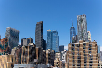 Obraz premium Lower Manhattan skyscraper stands under the blue sky on June 18, 2021 in New York City, USA.