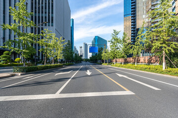 road with modern office building in hangzhou china