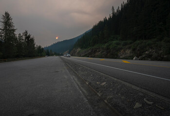 Highway forest fire smoke on the Trans Canada highway near Field, British Columbia