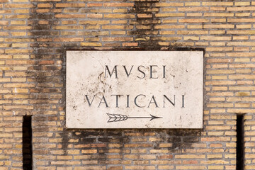 Street name Musei Vaticani - Engl: vatican museum -  painted at the wall in Rome