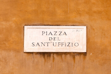 Street name piazza del sant uffizio - engl: square of the holy offices - painted at the wall in Rome