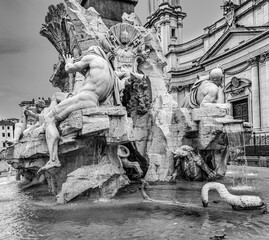 fiumi Fountain  ocated at the north end of the Piazza Navona - a sea horse with cupids and other sculptures in the background, Rome, Italy