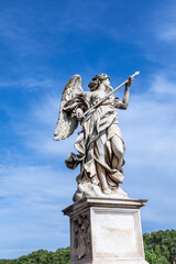 Fototapeta na wymiar statue at Aelian bridge also known unter name bridge of the holy angels which lead to the castel sant' Angelo, the castle of the holy angel