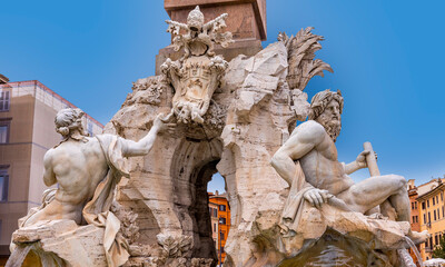 fiumi Fountain  ocated at the north end of the Piazza Navona - a sea horse with cupids and other sculptures in the background, Rome, Italy