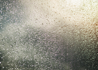 Naklejka na ściany i meble Water drops on window