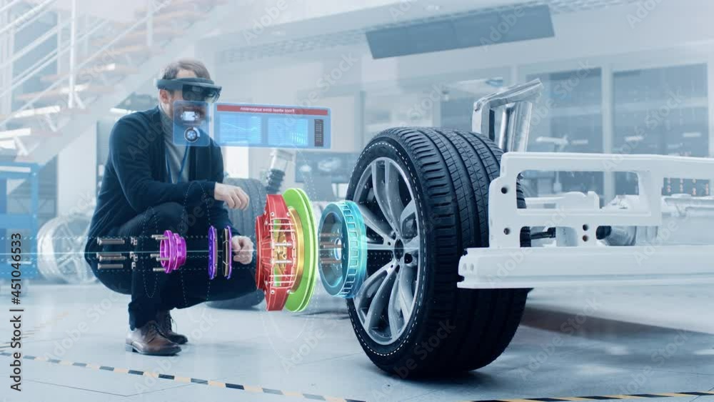 Leinwandbilder automotive engineer working on electric car chassis platform, using augmented reality headset with 3