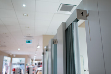 Fitting rooms in the store and number plates