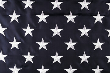 Embroidered stars on the American flag, close-up, top view