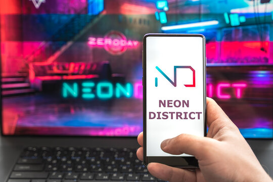 Russia Moscow 30.05.2021.Logo,screenshot of blockchain nft ethereum cryptocurrency kiber punk game Neon District in laptop, mobile phone. Man playing, collecting cards. Earning tokens,digital money