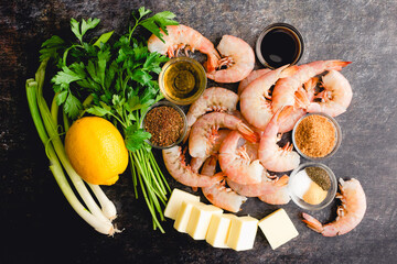 Ingredients for Cajun Shrimp in Butter Sauce: Raw shrimp, butter, spices, and other Cajun shrimp ingredients