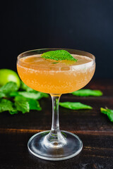 Old Cuban Cocktail Made with Rum, Mint, and Sparkling Wine: A cocktail made with dark rum and...
