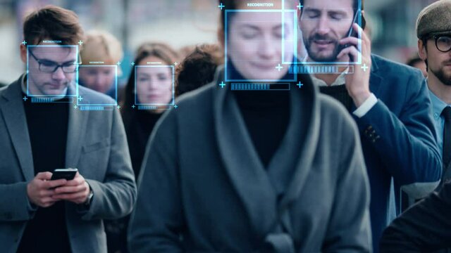 Crowd of Business People Tracked with Technology Walking on Busy Urban City Streets. CCTV AI Facial Recognition Big Data Analysis Interface Scanning, Showing Animated Information.