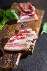 salted lard raw homemade pork fat smoked, dry-cured meal snack on the table copy space food background rustic. top view