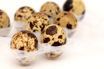 small boiled speckled quail eggs isolated on white 