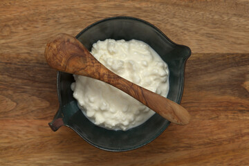 simple still life with cottage cheese in a ceramic bowl
