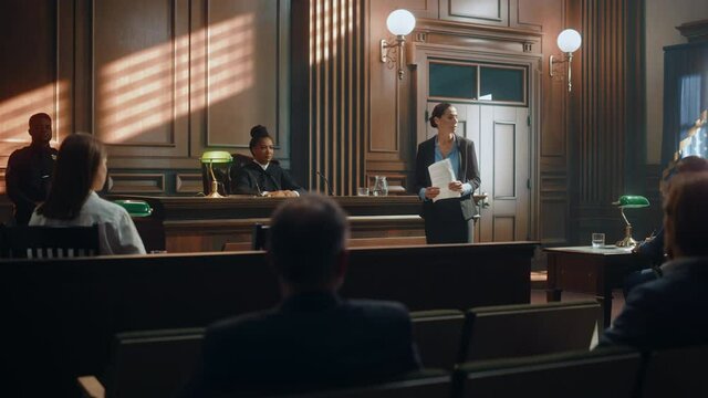 Court of Justice and Law Trial: Successful Female Prosecutor Presenting the Case, Making Passionate Speech to Judge, Jury. Attorney Lawyer Protecting Client with Closing Not Guilty Arguments.
