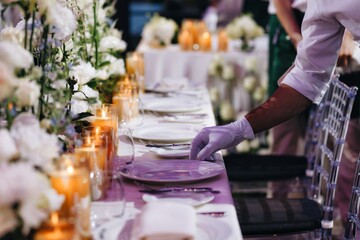 Romantic Wedding Table Top Layout Decor with large lush floral bouquets including white roses, ranunculus, persian buttercups, white orchids and candles